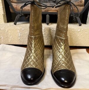 CHANEL Gold Quilted Ankle Boots with Black Toe